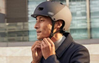 wearing helmet riding electric scooter
